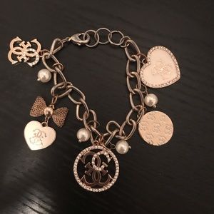 Guess Jewelry - Guess Gold Charm Bracelet Guess Jewelry - Guess Gold Charm Bracelet